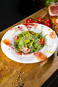 Rocket salad with dried Spanish ham