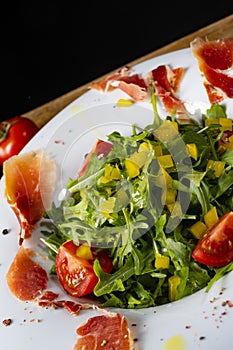 Rocket salad with dried Spanish ham