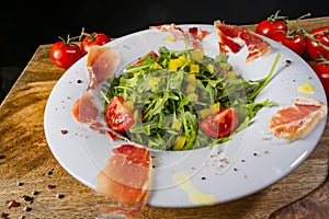 Rocket salad with dried Spanish ham