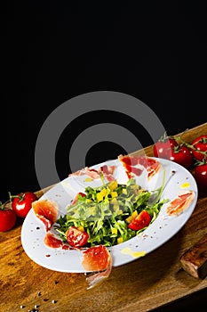 Rocket salad with dried Spanish ham