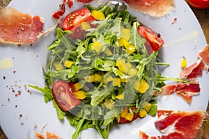 Rocket salad with dried Spanish ham