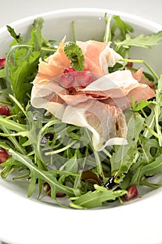 Rocket salad with parma ham and pomegranite seeds