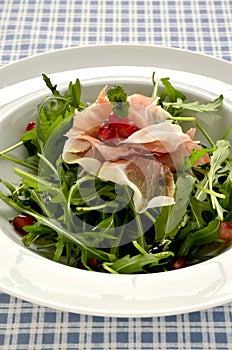 Rocket salad with parma ham and pomegranite seeds