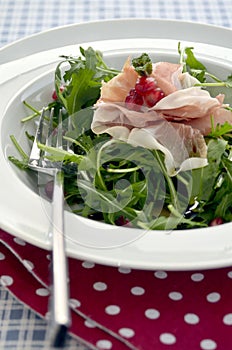 Rocket salad with parma ham and pomegranite seeds