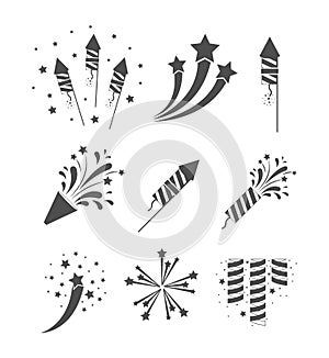 Rockets and fireworks bursting set in grayscale silhouette over white background
