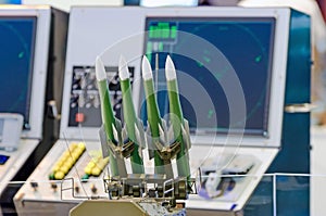 Rockets weapons, against the backdrop of the rocket launch control panel. Defense concept.