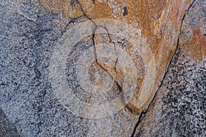 Rockface with cracks, veins and multiple colors