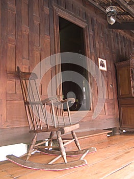 Rocking chair and teak house