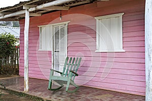 Rocking chairs in front of a home