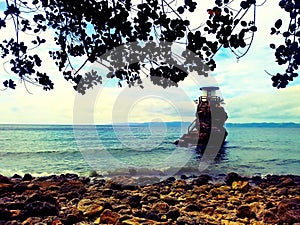 Rockmade lighthouse in the sea. Location: Liquson Mobo, Masbate