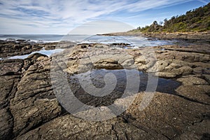 Rockpools along the coast at Bass Point Reserve on NSW South Coast in Australia photo