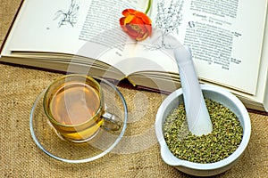 Rockrose tea with medieval textbook