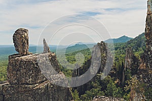 Rocks of Aigir in the smoke of a forest fire. Bashkortostan.