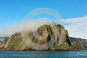 Rocks in the Avacha Bay of the Pacific Ocean. Coast of Kamchatka.