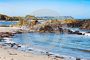 Rocks, beach and cliffs. Ballintoy, Northern Ireland, UK