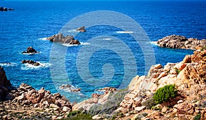 Rocks and blue sea in Costa Paradiso shore on a sunny day