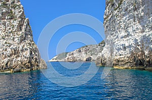 Rocks in blue sea - Ortholithos Rock, Paxos, Ionian Sea, Greece