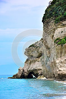 Rocks with caves and grottoes at the beach near Tropea, Calabria