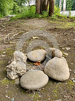 Rocks in a Circle Prepping for a Campfire