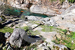 Rocks and clear Verzasca River in Lavertezzo, Ticino, Switzerland