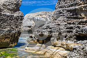 Rocks coastline near missing Azure Window in Gozo Island, Malta.