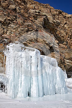 Rocks covered by ice on winter siberian Baikail lake