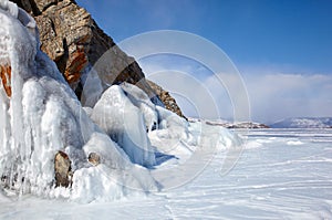 Rocks covered by ice on winter siberian Baikail lake