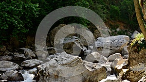 Rocks in Deva River as it passes through the Hermida Gorge in Cantabria photo