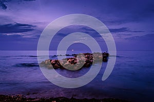 Rocks On The Evening Sea