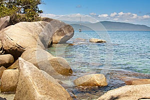Rocks on Fitzroy Island with blue clear ocean