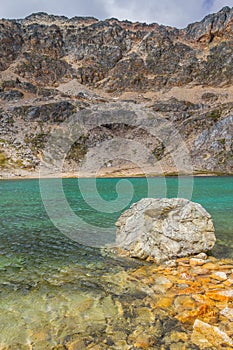 Rocks and green lake in Laguna Turquesa photo