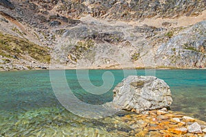 Rocks and green lake in Laguna Turquesa photo