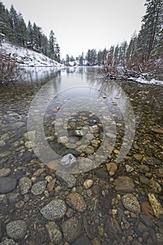 Rocks lining the river bed in winter