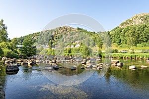 Rocks making a river rocky ford crossing near Algard town