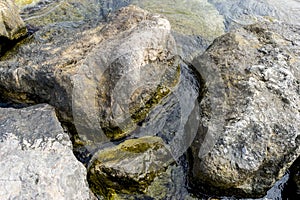 Rocks by the Mediterranean sea on the island of Ibiza in Spain,