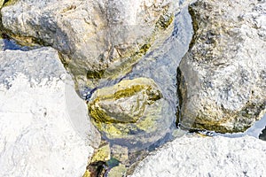 Rocks by the Mediterranean sea on the island of Ibiza in Spain,