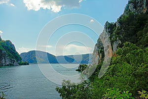 Rocks and mountains on the embankments of river Danube, Romania photo