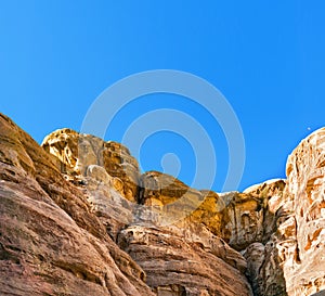 Rocks in mountains of Petra on sunny day