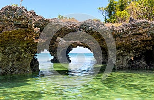 Rocks in ocean on Zanzibar ocean shore