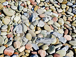 Rocks and Pebbles create shoreline on Lake Ontario