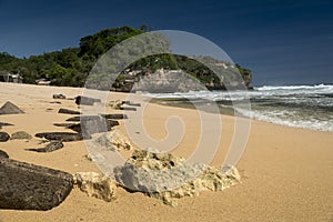 Rocks on the Pulang Sawai beach , Wonosari, Java, Indonesia photo