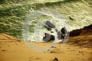 Rocks and sand along coast