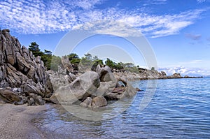 Rocks and sand in a beautiful beach in Chalkidiki, Greece