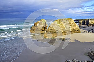 rocks on a sandy beach. Praia de Augas Santas, Ribadeo photo