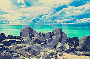 Rocks , sea and blue sky , Lipe island Thailand - vintage color effect