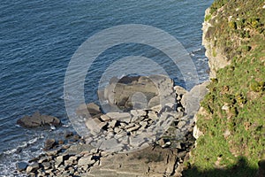 Rocks on sea edge, Lynton, Devon, England