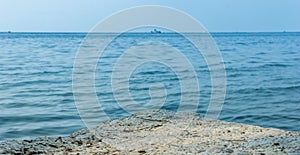 Rocks sea. Focus rocky sea blurred background.