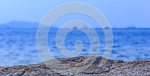 Rocks sea. Focus rocky sea blurred background.