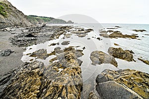rocks in the sea, photo as a background , in principado de asturias, spain europe photo