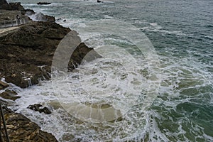 Rocks, Sea raging wild waves in the sea of the city of Santander, Spain